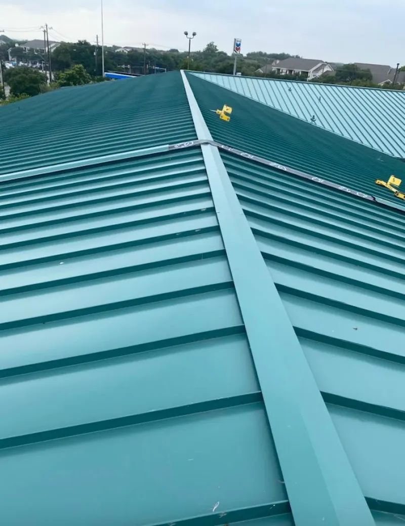 Green commercial metal roof ridge and valley for Metal Roof Repair in Bryn Mawr-Skyway